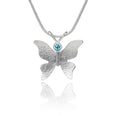Textured silver butterfly necklace blue topaz